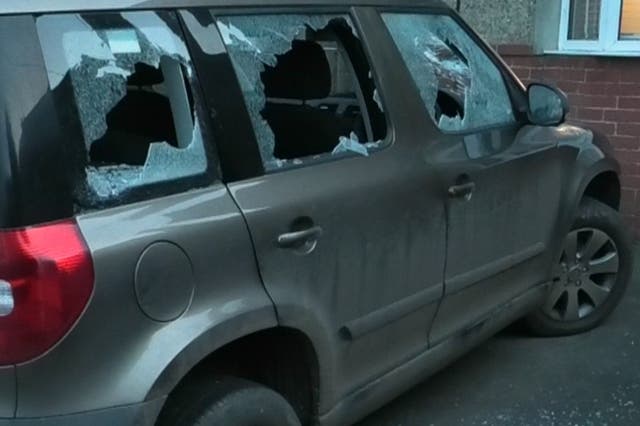 <p>Car with windows smashed</p>