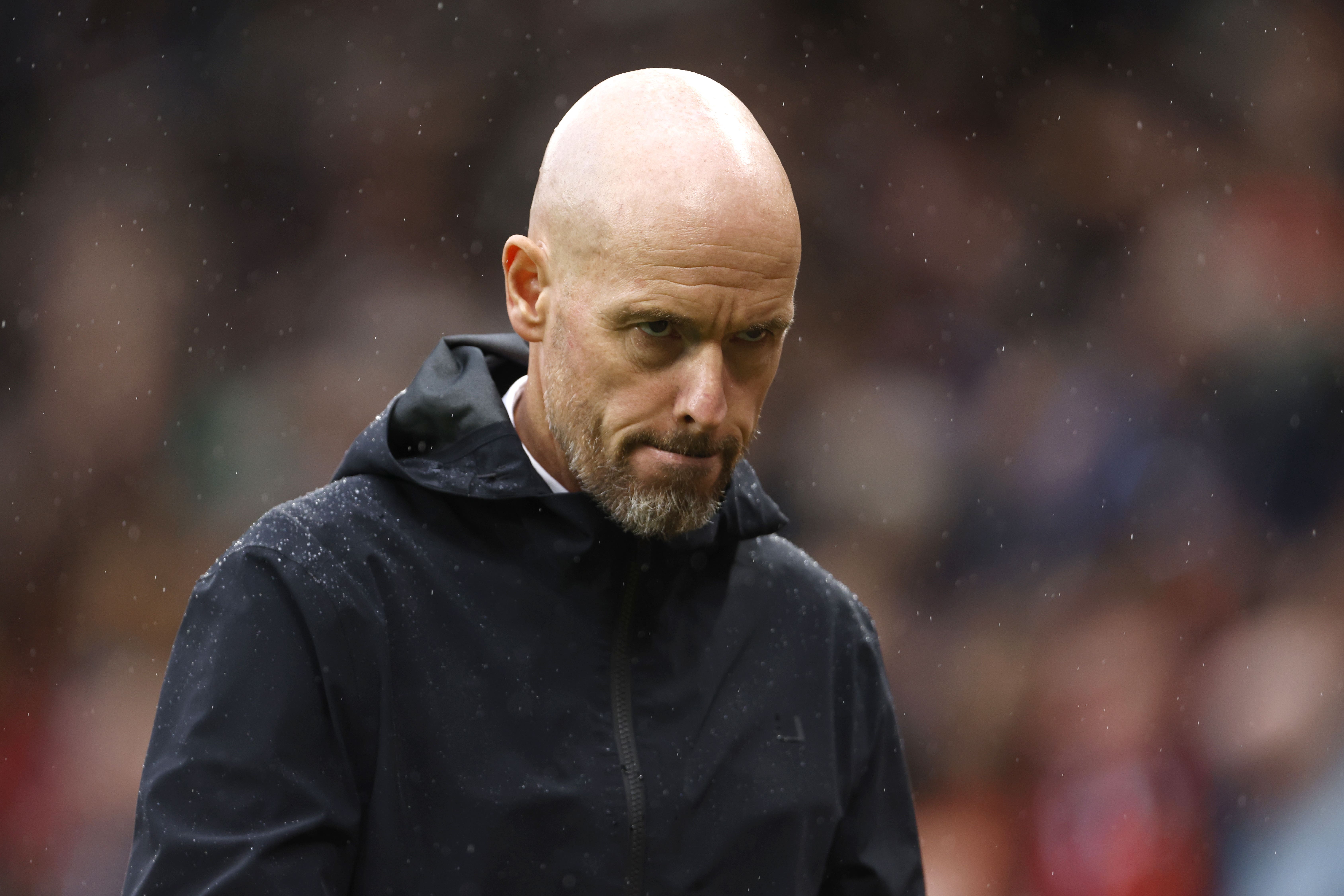  Erik ten Hag looking determined on the sidelines during a match.