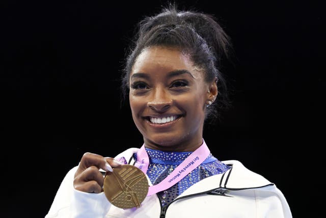 American Simone Biles became the most decorated gymnast in history with all-around victory at the 2023 World Championships (Geert vanden Wijngaert/AP)