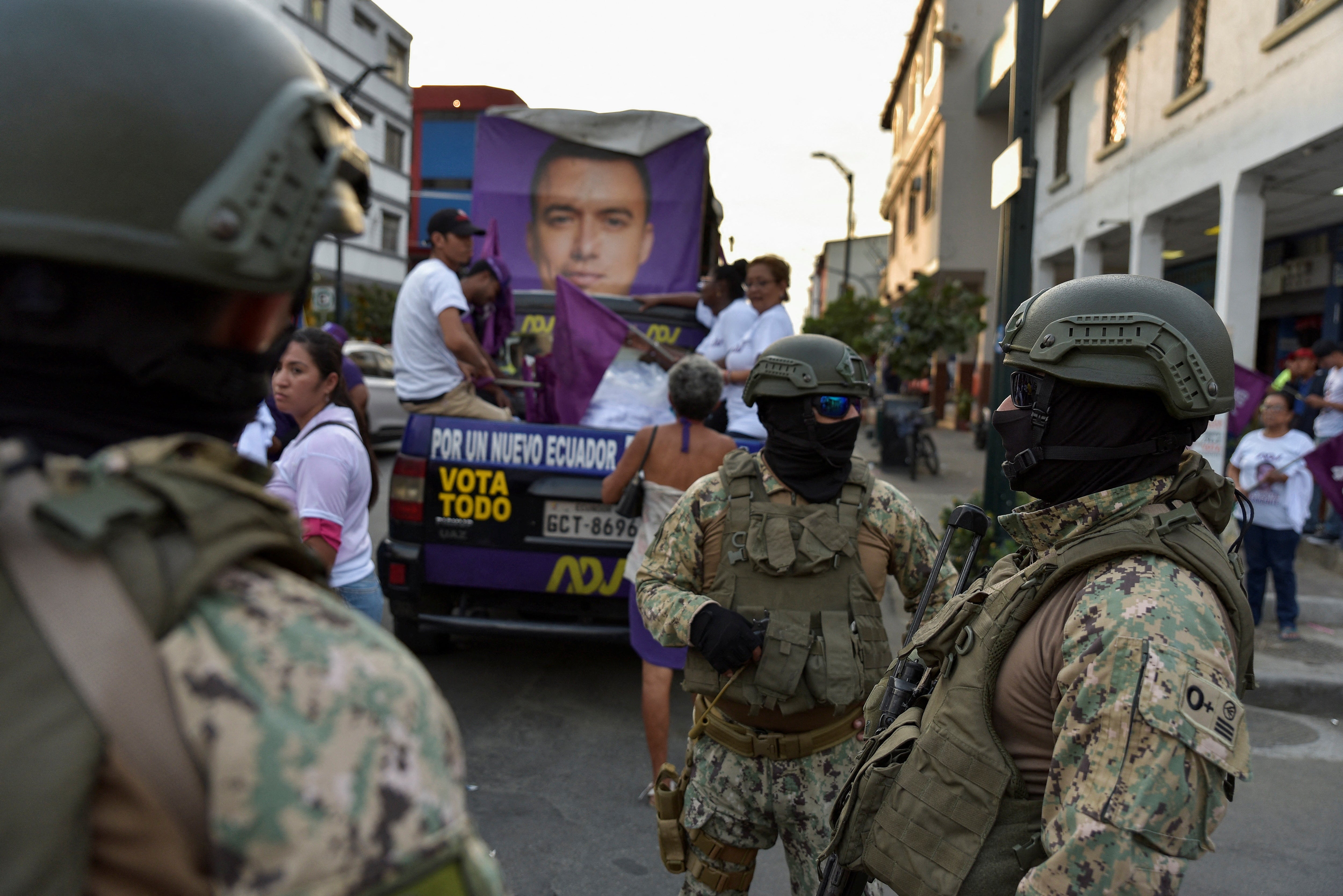 Soldiers secure an area before the arrival of Ecuadorean presidential candidate Daniel Noboa, who was taking part in a rally on Friday ahead of the October 15 run-off
