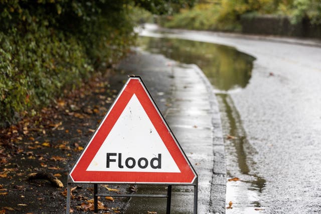 A flood warning sign in Dumbarton, West Dunbartonshire (Robert Perry/PA Wire)