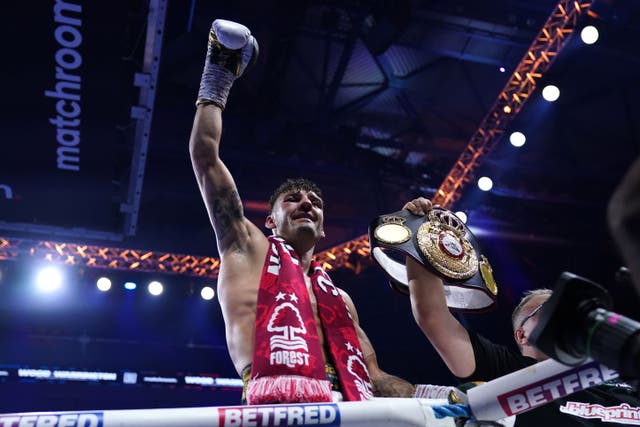 <p>Leigh Wood celebrates victory against Josh Warrington in their WBA featherweight world title contest at Utilita Arena Sheffield (Nick Potts/PA)</p>