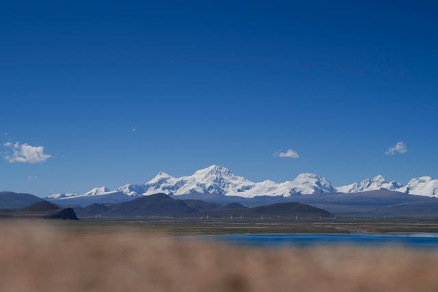 <p>In this photo released by Xinhua News Agency, Mount Shishapangma is seen from Baiku Lake in Xigaze, southwest China’s Tibet Autonomous Region on 2 September 2023</p>