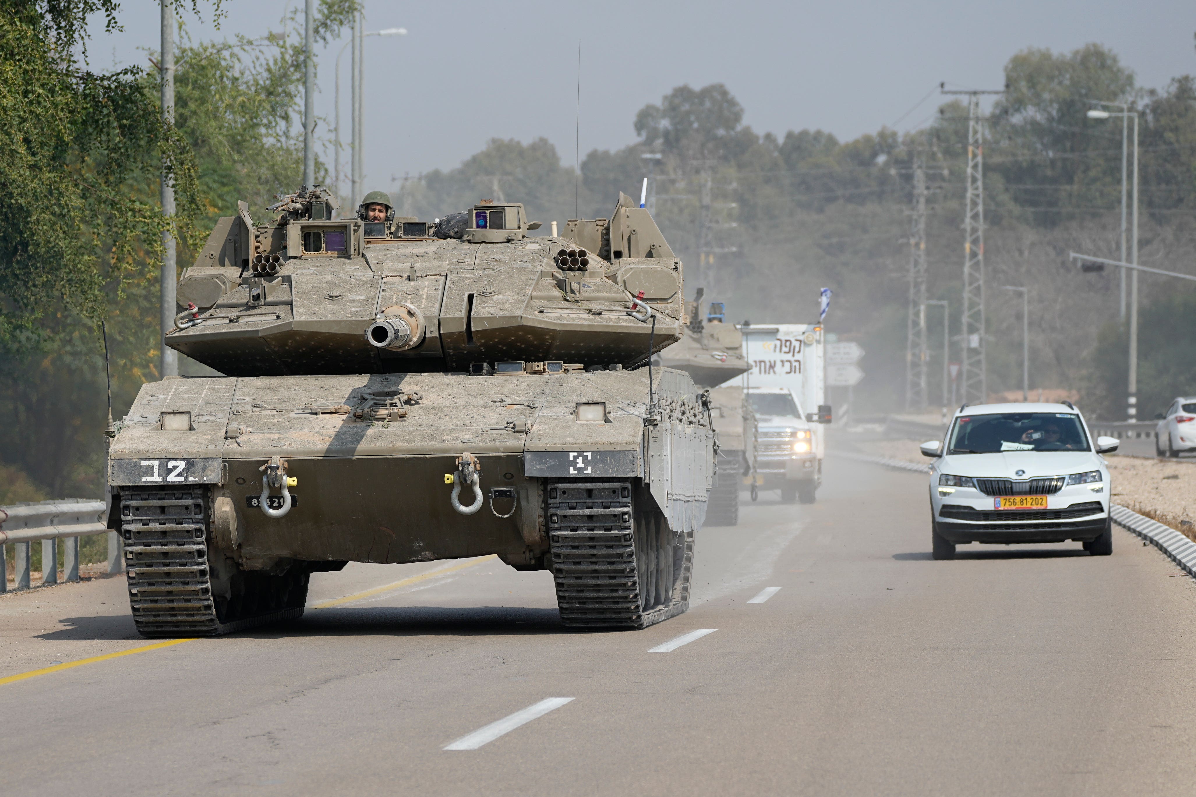 Israeli tank heads south near Sderot, Israel (Ohad Zwigenberg/AP)