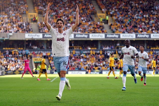 Aston Villa’s Pau Torres celebrates his equaliser at Wolves (Tim Goode/PA)