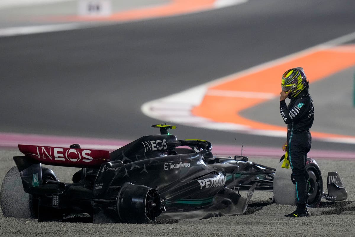 Lewis Hamilton reacts after first-corner collision with George Russell