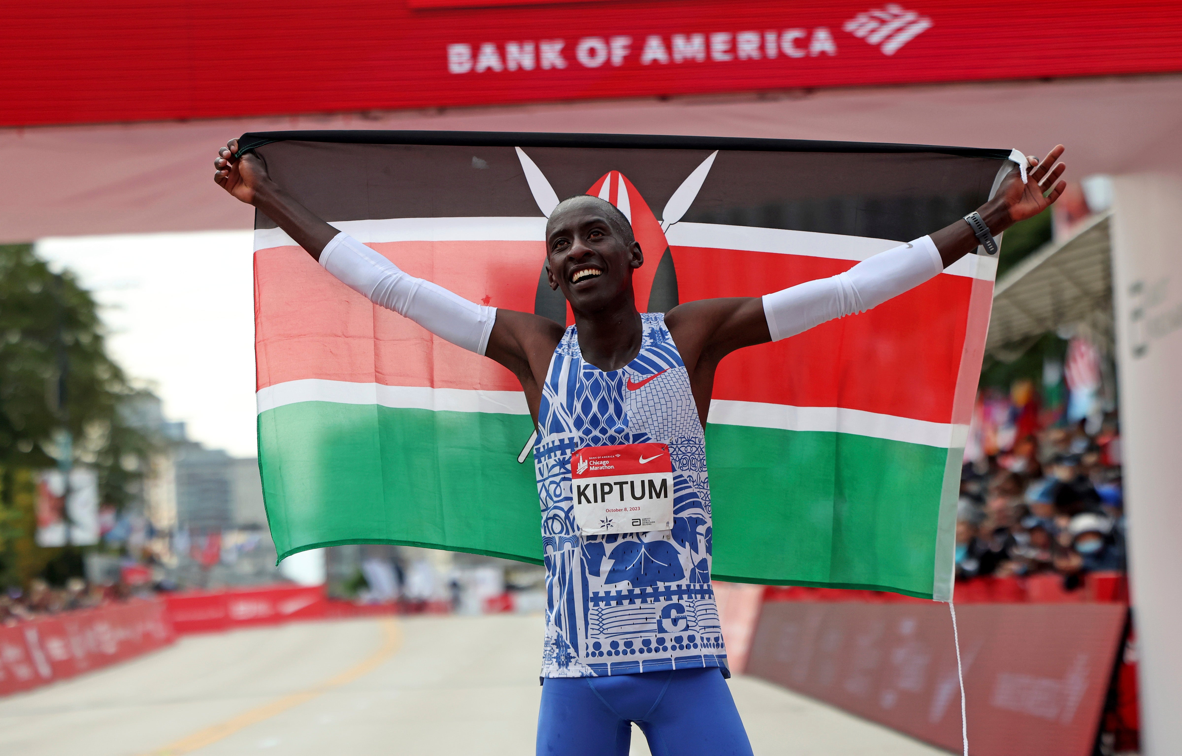 <p>Kelvin Kiptum celebrates winning the Chicago Marathon and breaking the world record </p>