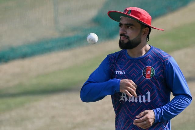 <p>Afghanistan’s Rashid Khan spins the ball during a practice session on the eve of their 2023 ICC men’s cricket World Cup one-day international (ODI) match against Bangladesh at the Himachal Pradesh Cricket Association Stadium in Dharamsala on 6 October</p>