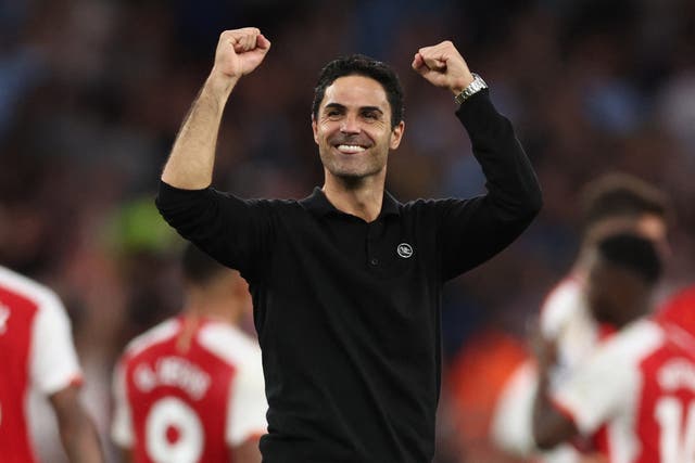 <p>Mikel Arteta celebrates after Arsenal clinch a late victory against City </p>