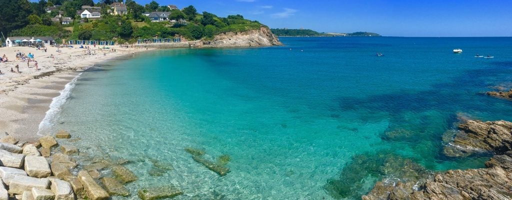 Swanpool’s small, sandy cove and turquoise bay