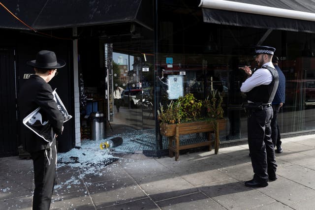 <p>Police at the scene of the break in in Golders Green  </p>