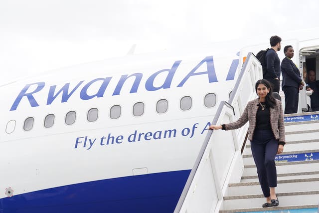 <p>Suella Braverman disembarks after arriving at Kigali international airport to visit Rwanda</p>