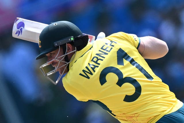 <p>Australia’s David Warner watches the ball after playing a shot during the 2023 ICC Men’s Cricket World Cup one-day international (ODI) match between India and Australia at the MA Chidambaram Stadium in Chennai on 8 October</p>