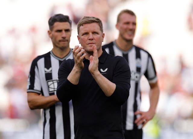 <p>Eddie Howe salutes Newcatle fans after a draw at West Ham</p>
