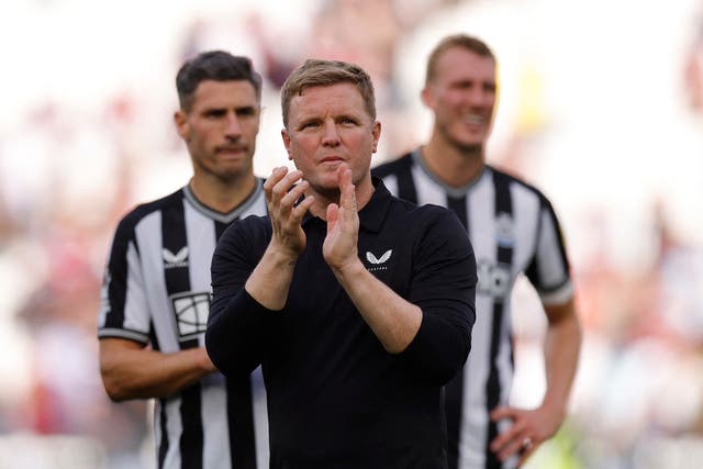 <p>Eddie Howe salutes Newcatle fans after a draw at West Ham</p>