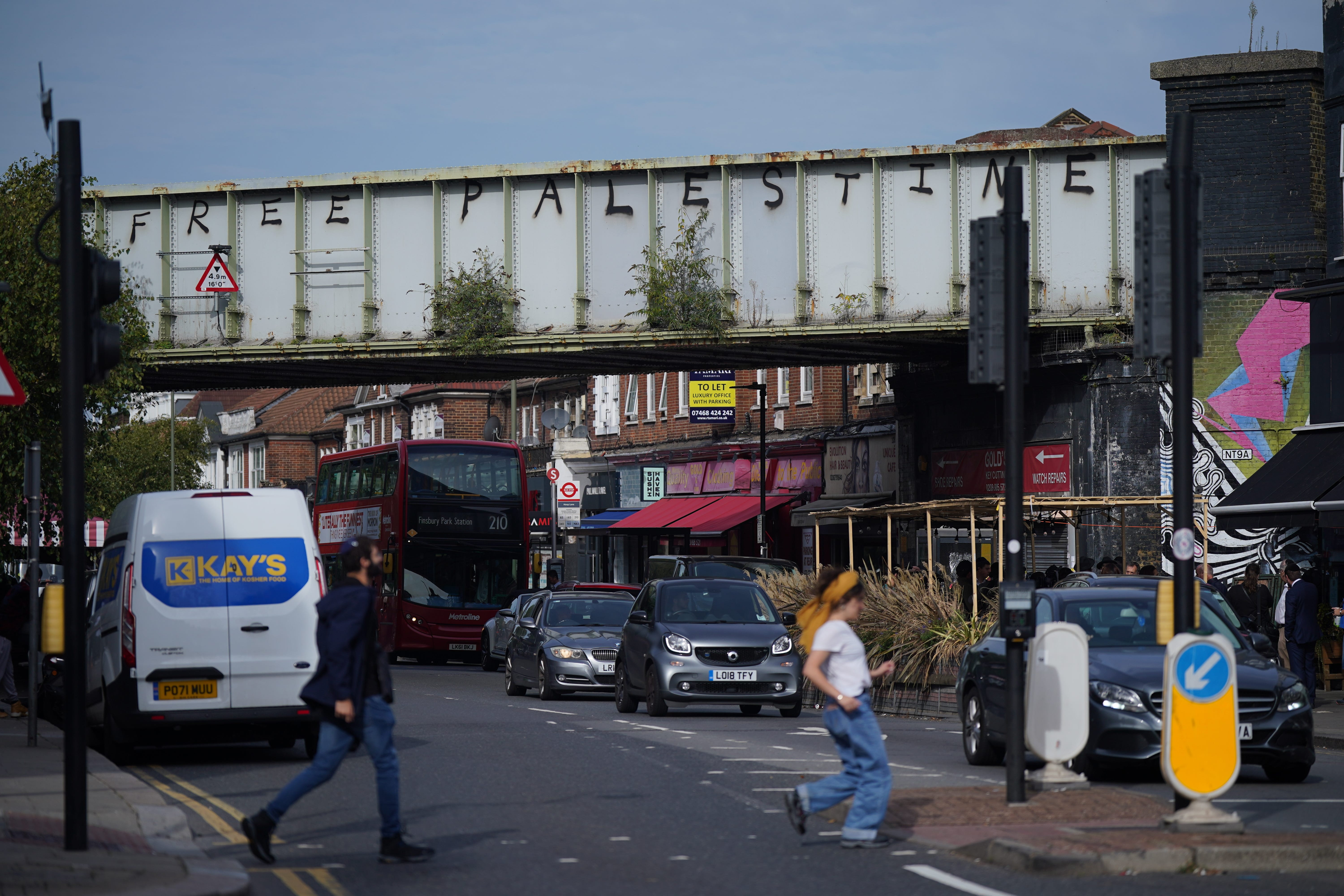 Pro Palestinian graffiti was sprayed on a railway bridge in Golders Green, north London, an area with a prominent Jewish population