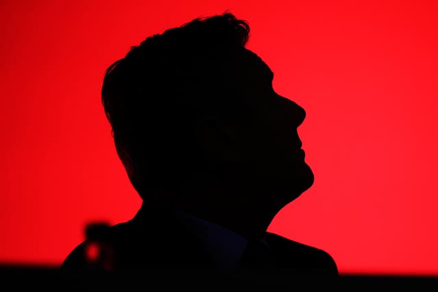 <p>Labour Party leader Sir Keir Starmer is silhouetted as he watches a video screen on day one of the annual Labour party conference on 8 October, 2023, in Liverpool, England</p>