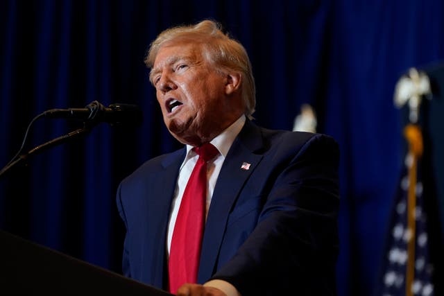 <p>Former President Donald Trump speaks during a commit to caucus rally on 7 October in Iowa</p>