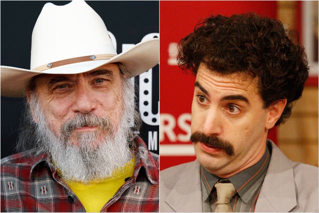 <p>Larry Charles (left) and Sacha Baron Cohen as Borat</p>