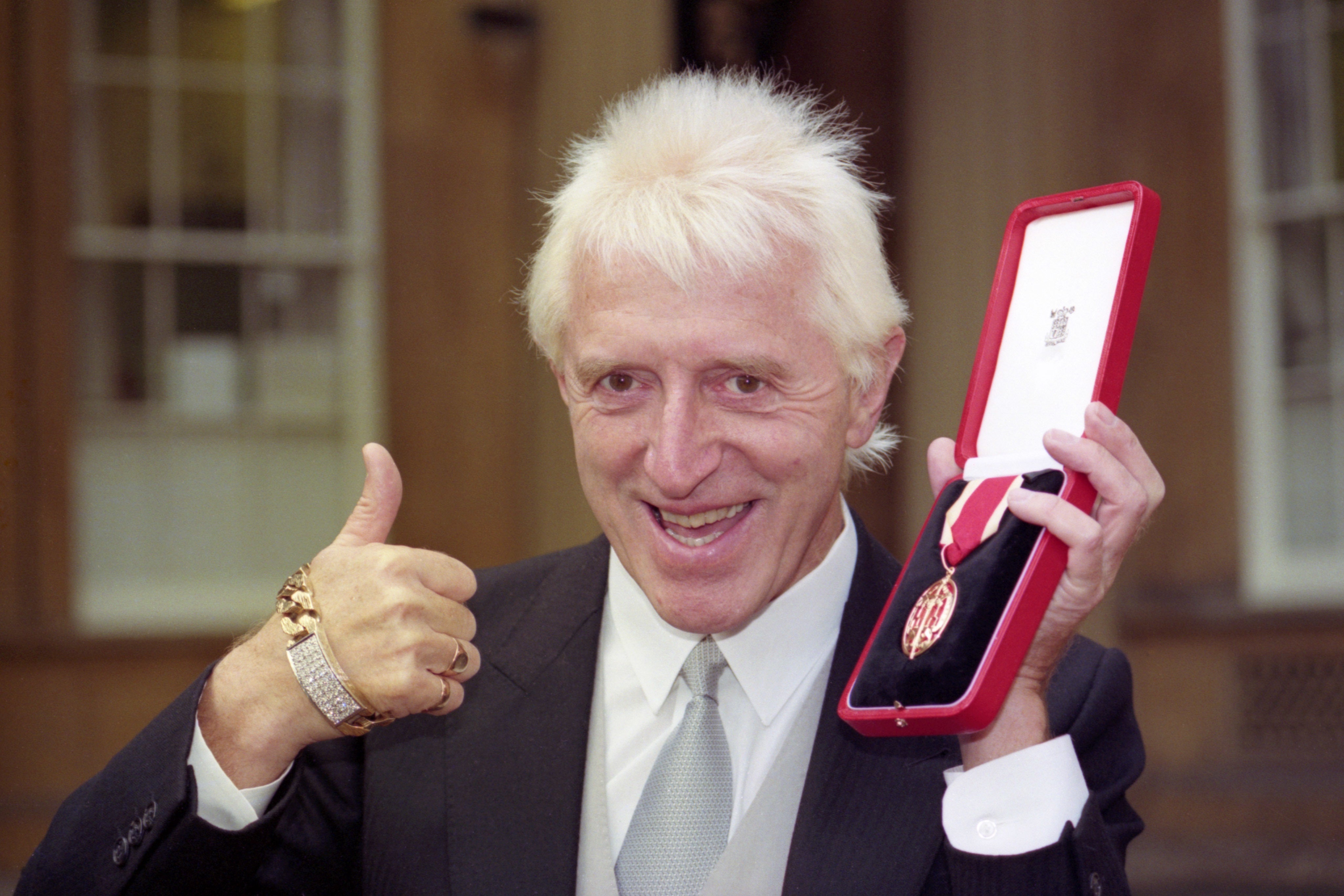 Jimmy Savile with his Knight Bachelor insignia