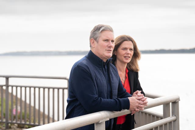 Labour leader Sir Keir Starmer and his wife Victoria take a walk by the River Mersey in Liverpool during the Labour Party Conference. Tomorrow he will deliver his keynote speech to delegates. Picture date: Monday October 9, 2023.