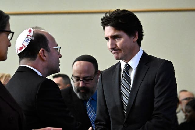 <p>Canada Prime Minister Justin Trudeau shakes hands with Rabbi Daniel Mikelberg after his remarks at a a rally in support of Israel, at the Soloway Jewish Community Centre in Ottawa,</p>