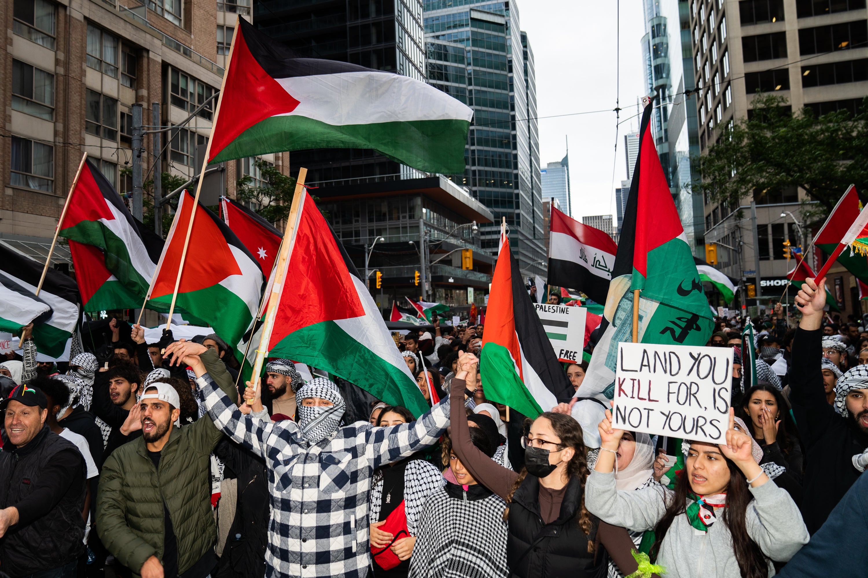 Pro-Palestinian demonstrators participate in a rally in Toronto