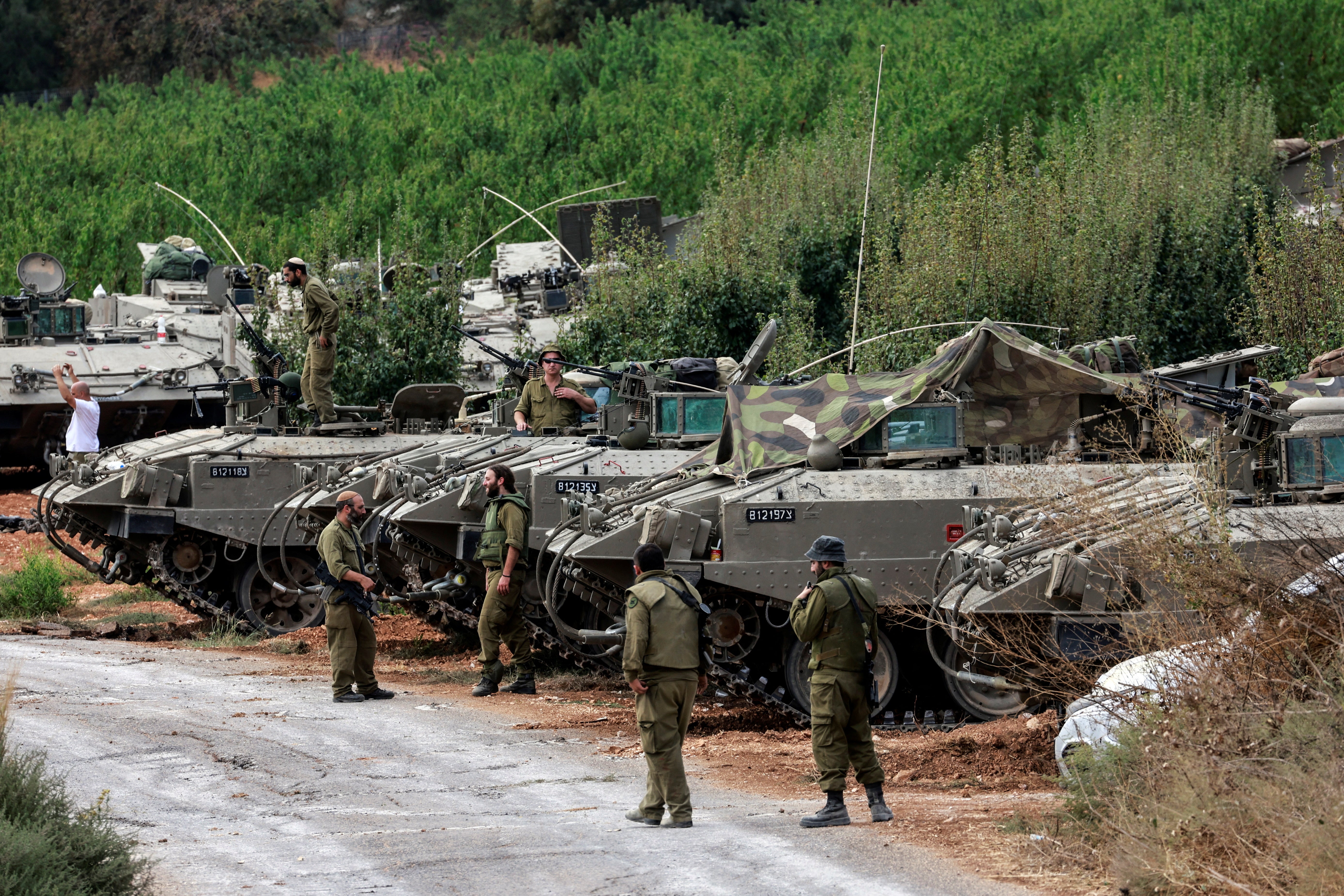 Soldiers with Armoured Personnel Carriers (APCs) near Israel’s border with Lebanon