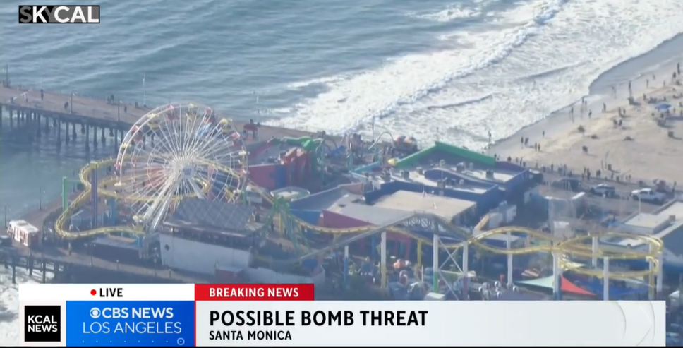The Santa Monica Ferris wheel was evacuated after a man threatened to have a bomb as he climbed up the ride