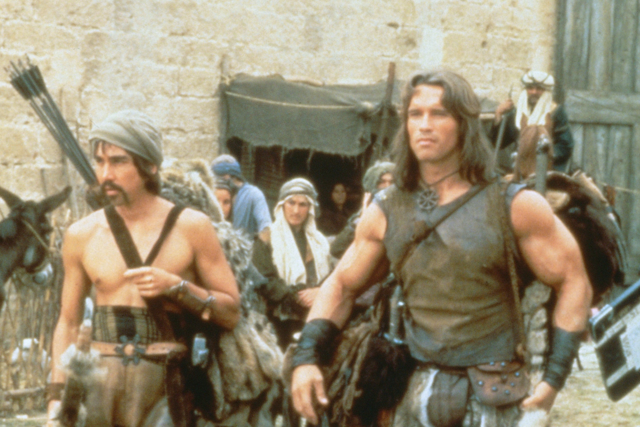 Arnold Schwarzenegger (right) as Conan the Barbarian