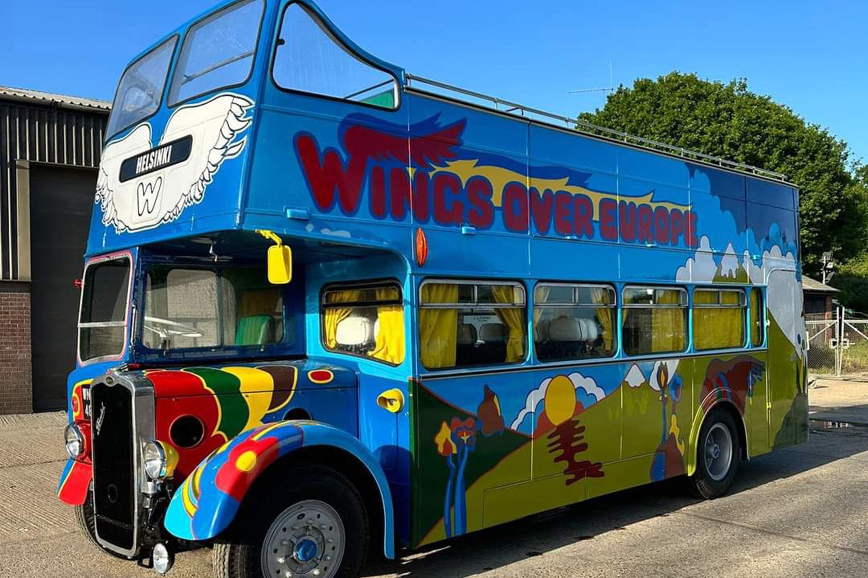 The bus is painted with psychedelic artwork, designed after The Beatles’ Yellow Submarine album cover (Julien’s Auctions/PA)