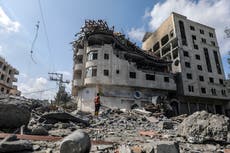 ‘Gunpowder is in the air but I will not leave my home’: Gaza resident’s act of defiance