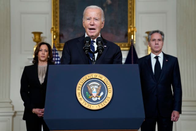 <p>President Joe Biden speaks Tuesday, Oct. 10, 2023, in the State Dining Room of the White House in Washington, about the war between Israel and the militant Palestinian group Hamas, as Vice President Kamala Harris and Secretary of State Antony Blinken listen. (AP Photo/Evan Vucci)</p>