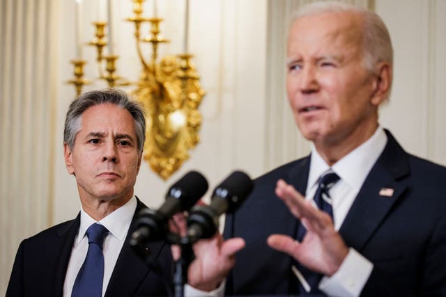 <p>Secretary of State Antony Blinken looks on as President Joe Biden delivers remarks on Israel</p>