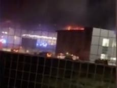 Flights suspended at Luton Airport after fire engulfs car park