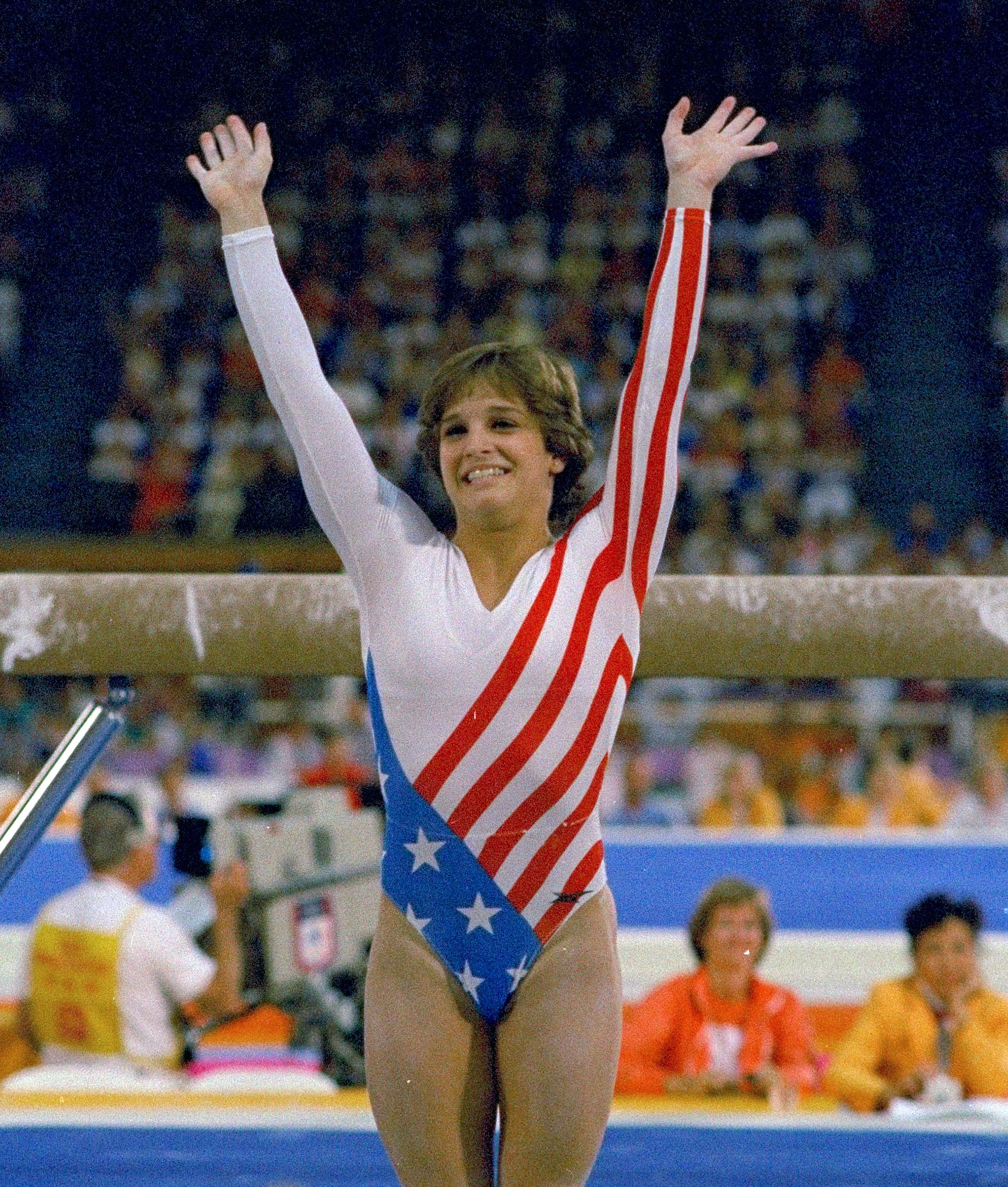 FILE- Mary Lou Retton reacts to applause after her performance at the Summer Olympics in Los Angeles on Aug. 3, 1984.
