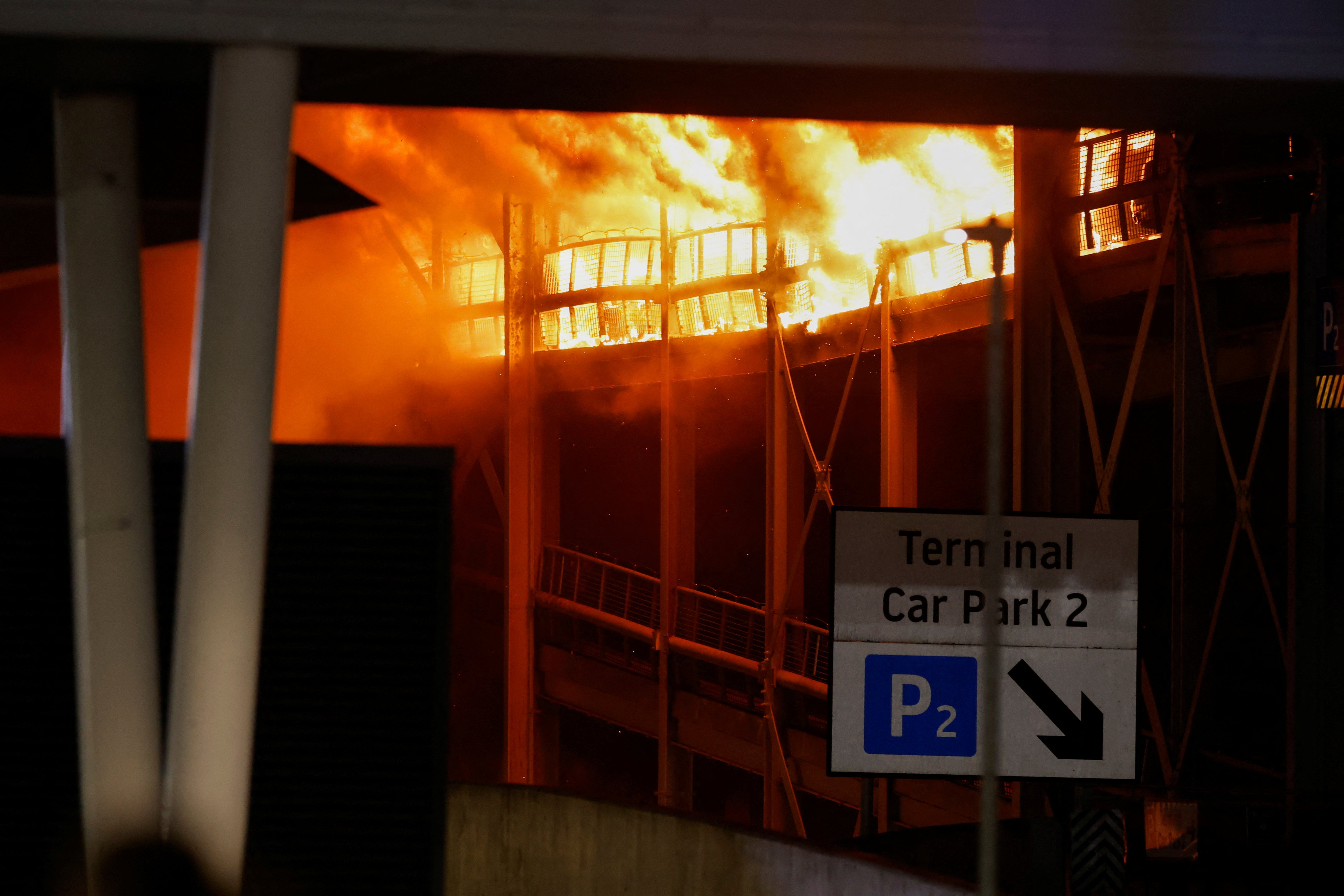 A vehicle fire caused the London Luton airport car park to partially collapse