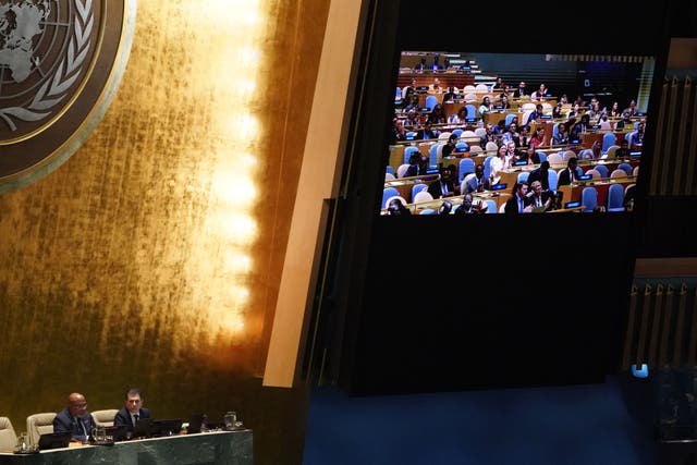 <p>UN General Assembly President Dennis Francis (lower, L) reads the election results of new members to the Human Rights Council, at UN headquarters in New York City</p>