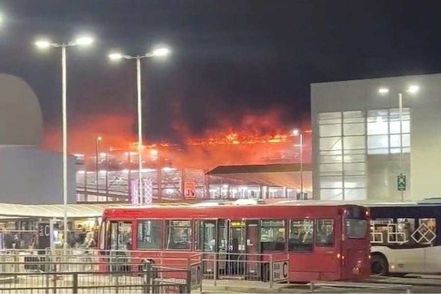 Screen grab taken with permission from video posted on X by @Soriyn23 of a fire at a car park at Luton Airport (X/SoRin)