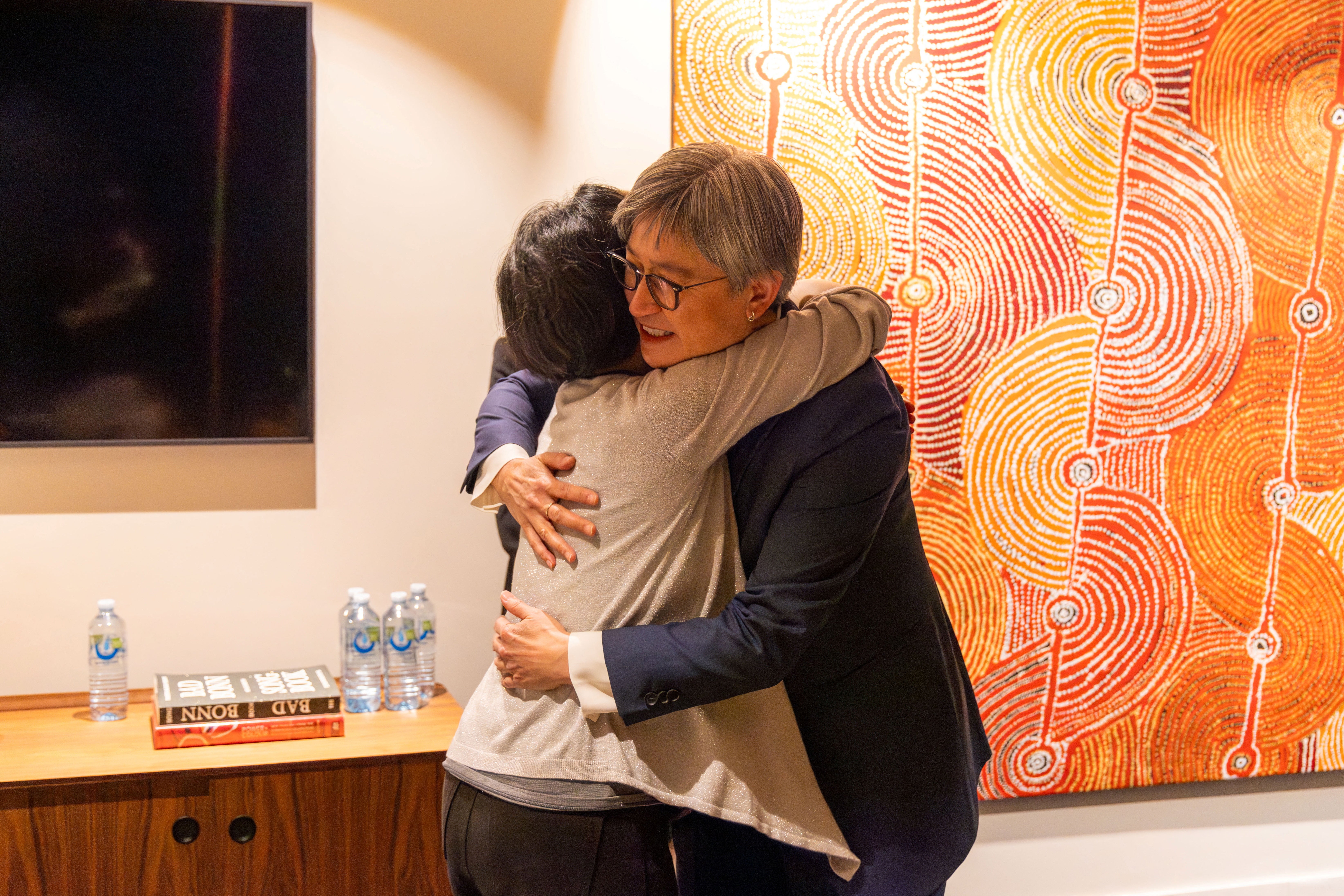 Australian foreign minister Penny Wong meets Australian journalist Cheng Lei on arrival at Melbourne Airport in Melbourne, 11 October 2023