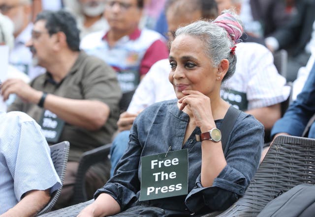 <p> Indian author Arundhati Roy attends a journalists protest at a press club in New Delhi,</p>