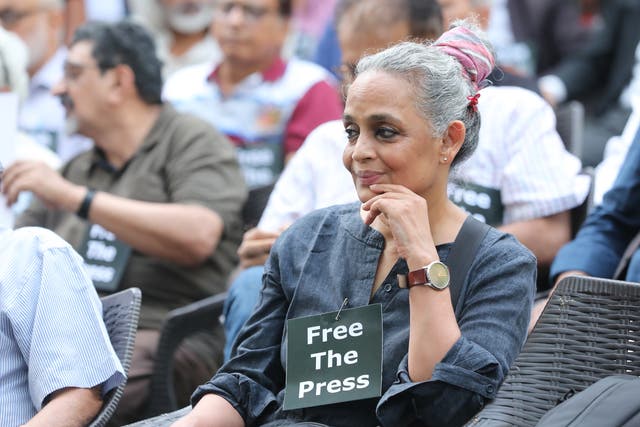 <p> Indian author Arundhati Roy attends a journalists protest at a press club in New Delhi,</p>