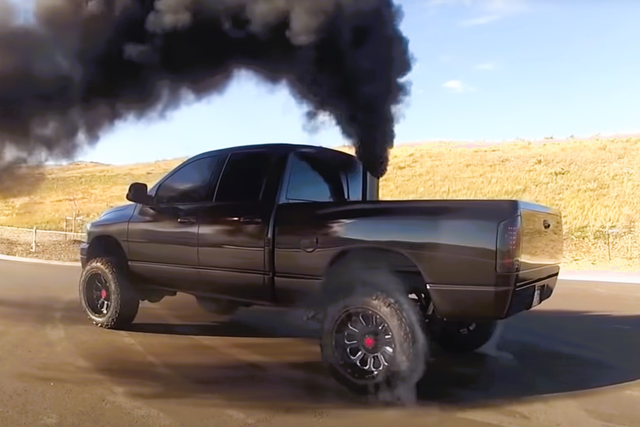 <p>Rolling coal was outlawed in the US in 2014 but the practice of modifying diesel engines to emit black fumes continues</p>
