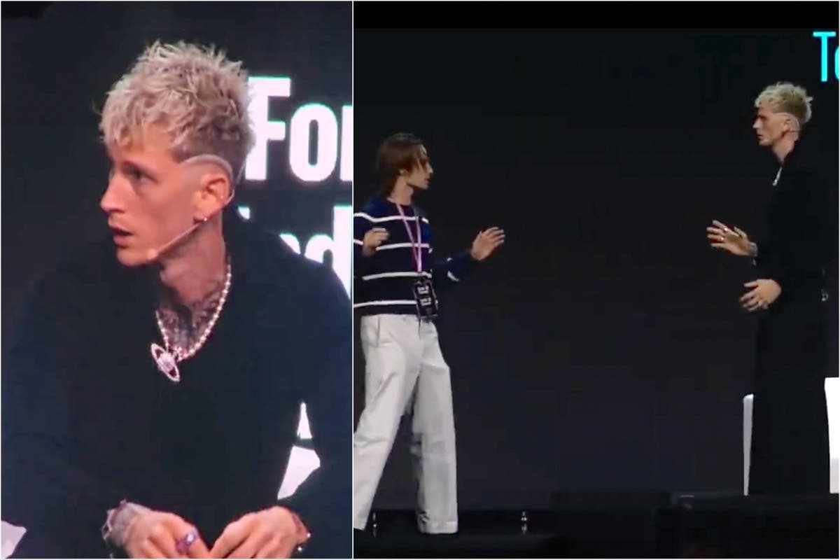 Machine Gun Kelly jumps to defend himself after fan rushes at him on stage at Forbes Under 30 Summit