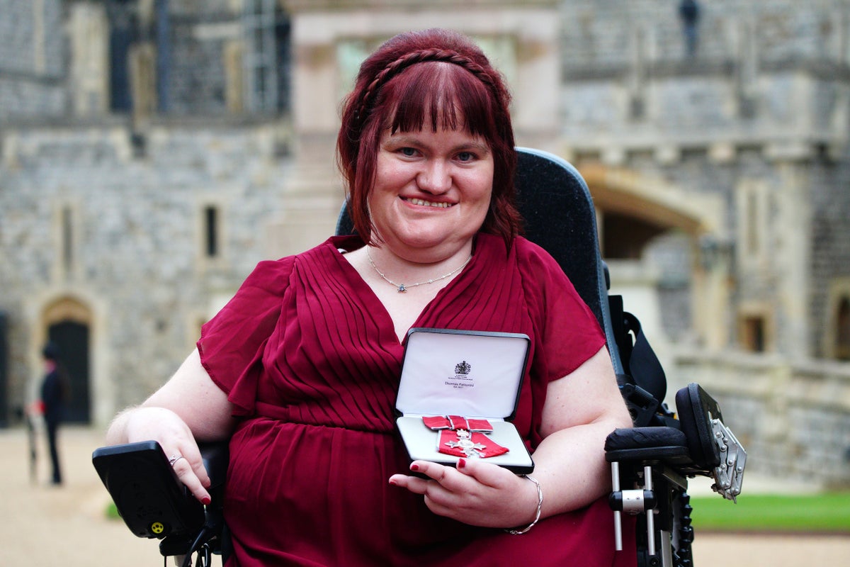 Disability rights activist becomes MBE in Windsor Castle ceremony