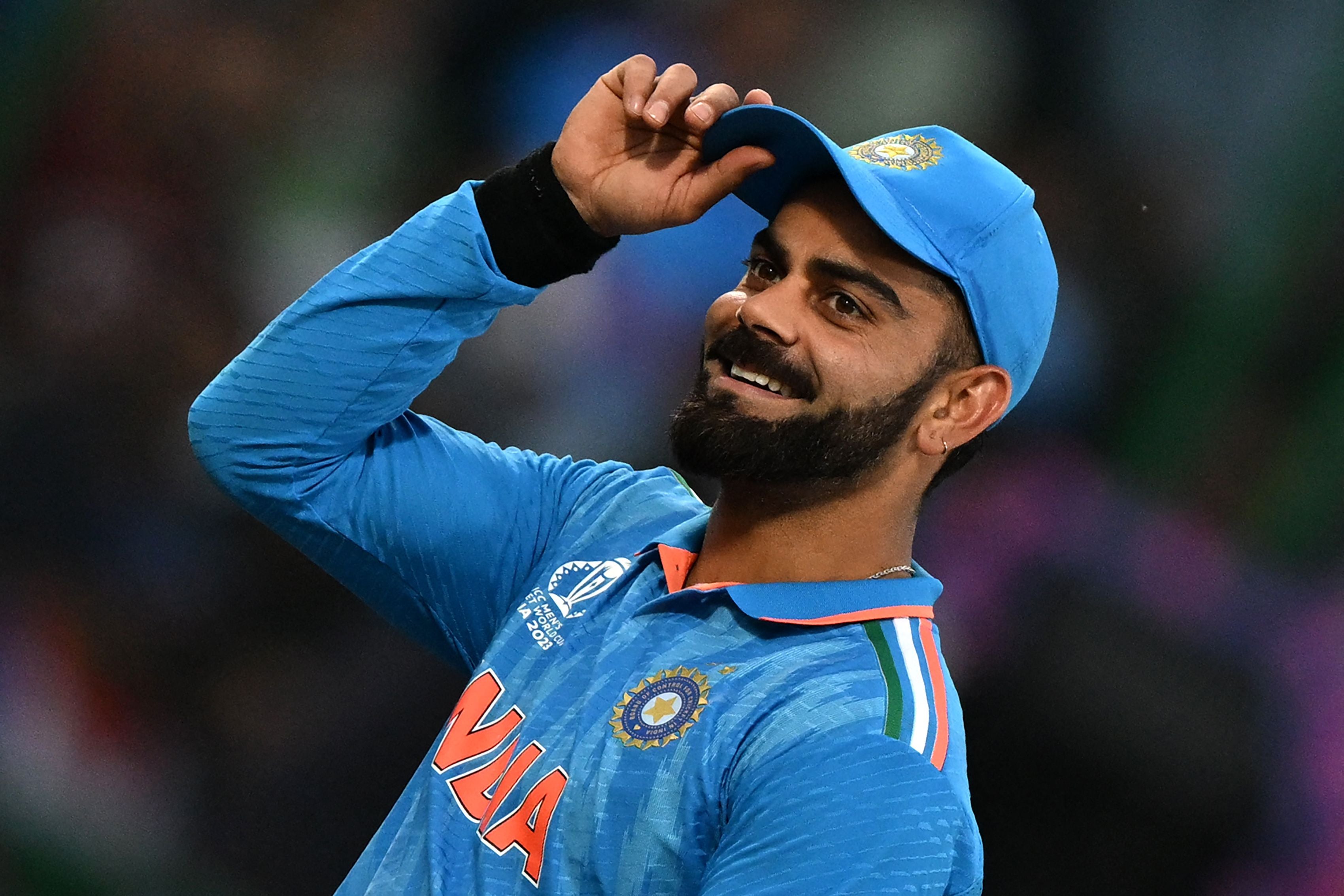 Virat Kohli gestures to spectators during the 2023 ICC Men’s Cricket World Cup one-day international (ODI) match between India and Afghanistan at the Arun Jaitley Stadium in New Delhi on 11 October