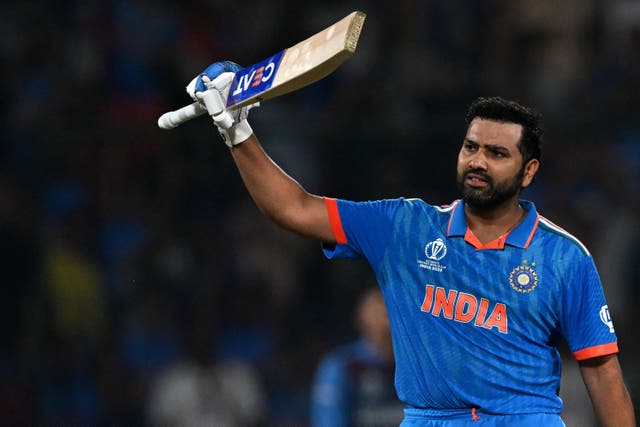 <p>India’s captain Rohit Sharma celebrates after scoring a century during the 2023 ICC Men’s Cricket World Cup one-day international (ODI) match between India and Afghanistan</p>