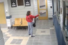 Woman fires gunshots inside Connecticut police station in newly-released CCTV footage