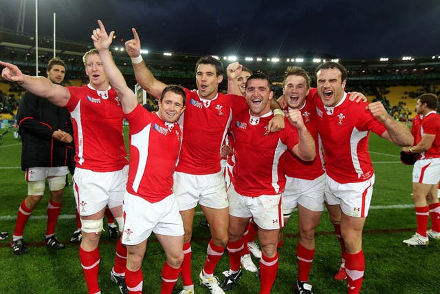 Wales players celebrate after knocking Ireland out of the World Cup in 2011 (David Davies/PA)