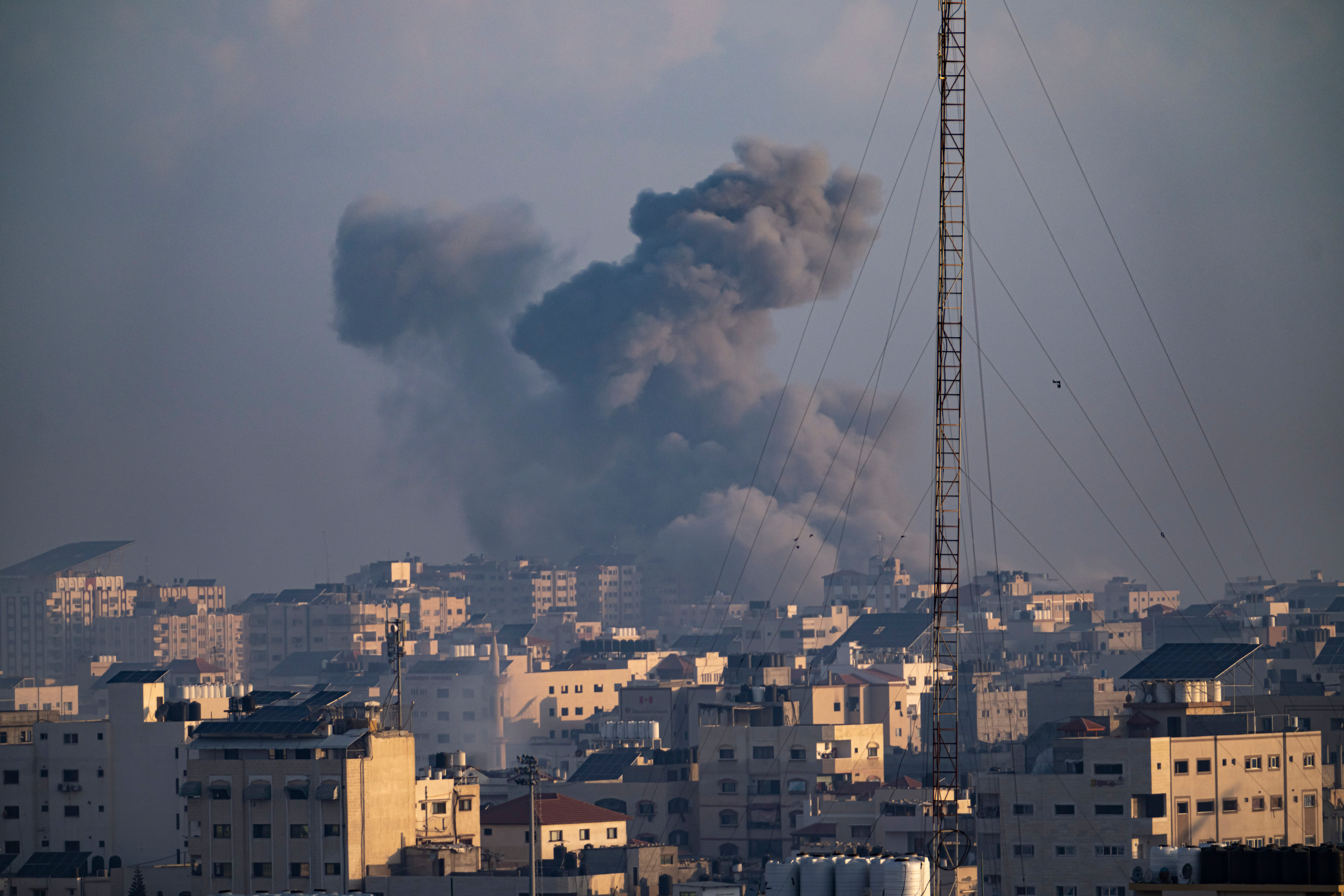 Smoke rises following an Israeli airstrike in Gaza City, (AP Photo/Fatima Shbair)